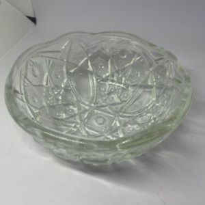 Elegant Glass Bowl accented with scalloped edges